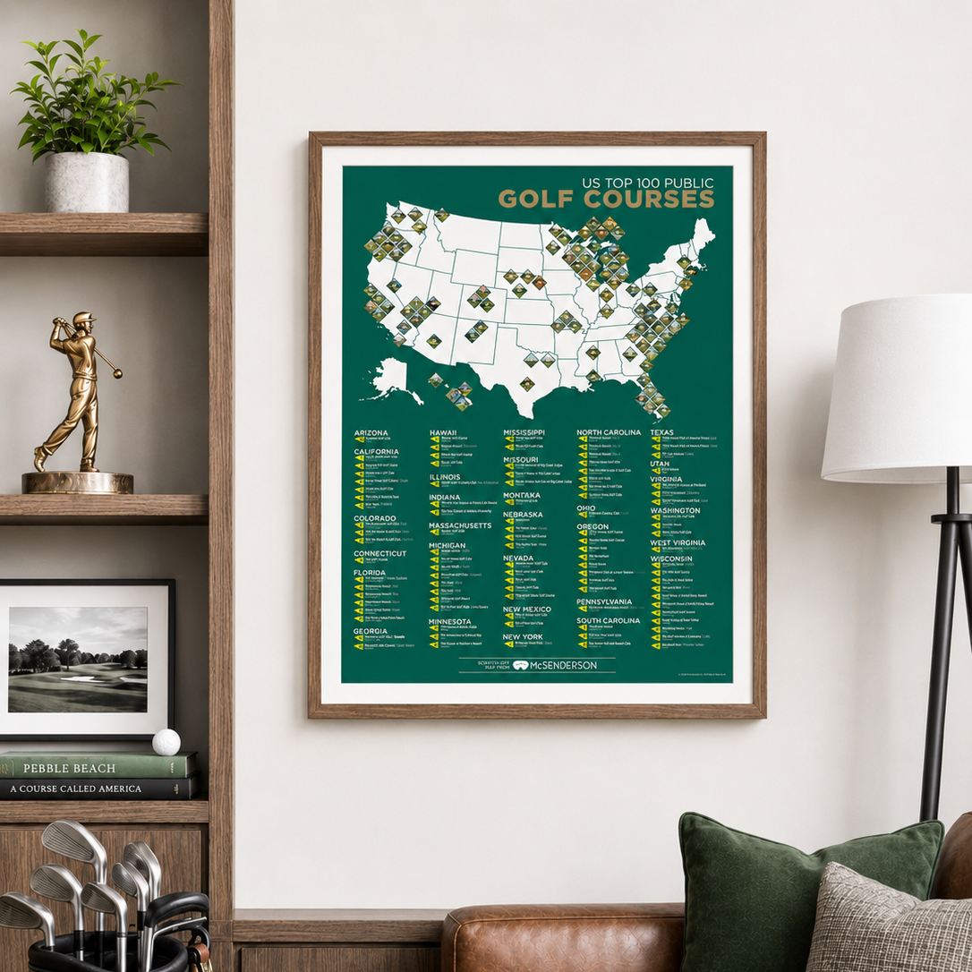 A framed golf course map poster hanging on a wall in a styled living room with a brown leather sofa, shelf decor, and a lamp.
