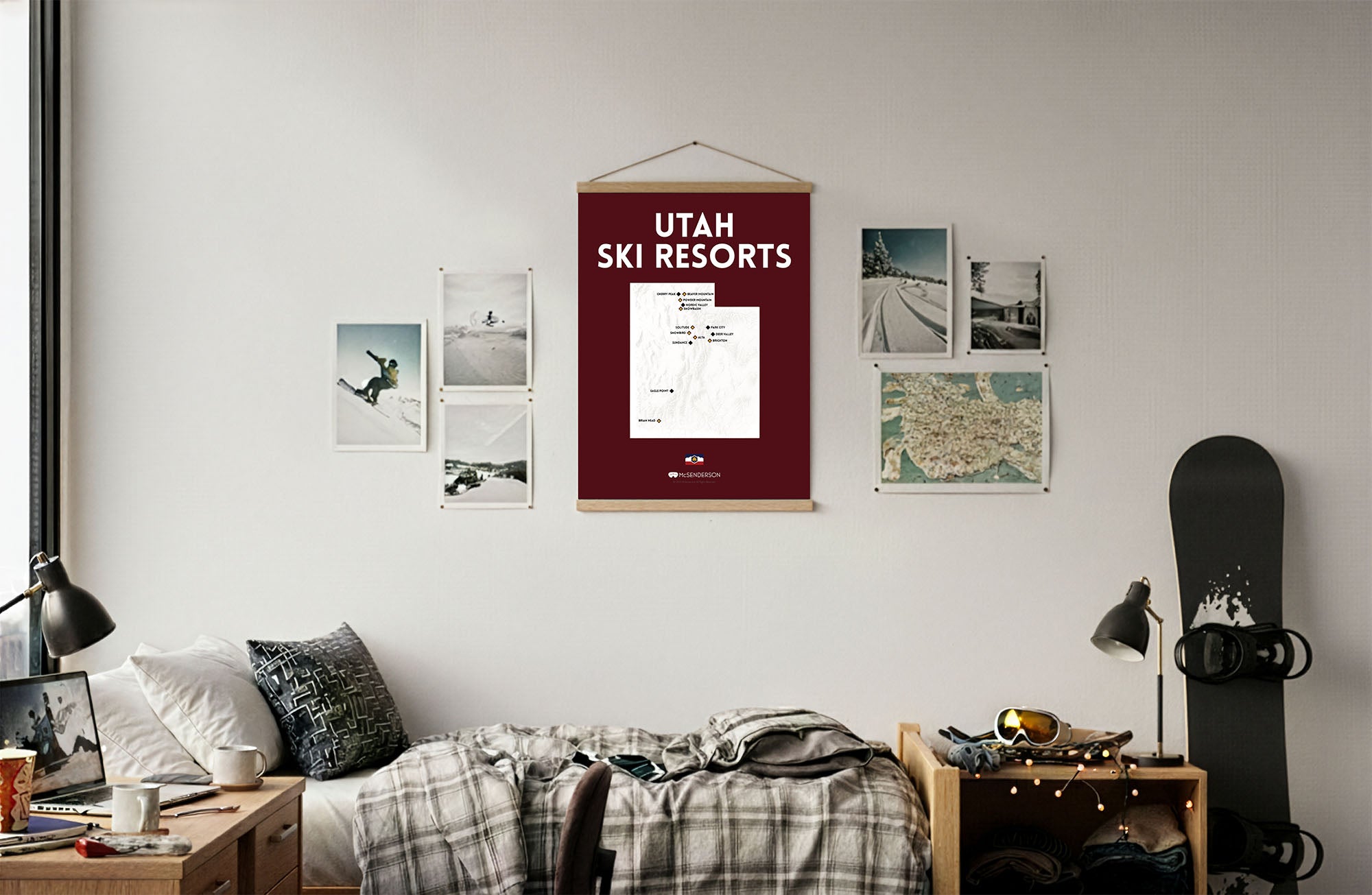 Room interior with a bed, desk, and Utah ski resorts poster on the wall