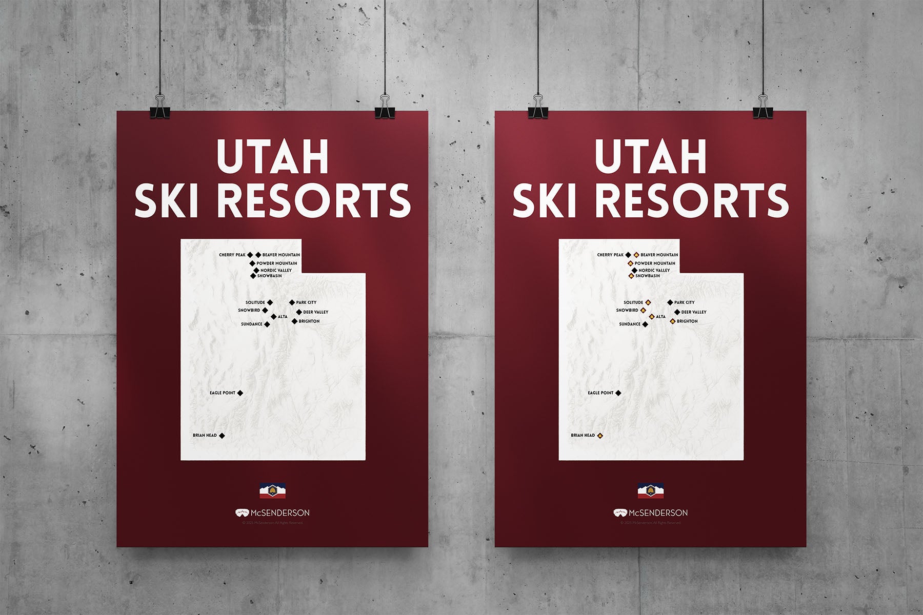 Two posters titled 'Utah Ski Resorts' hanging on a concrete wall.