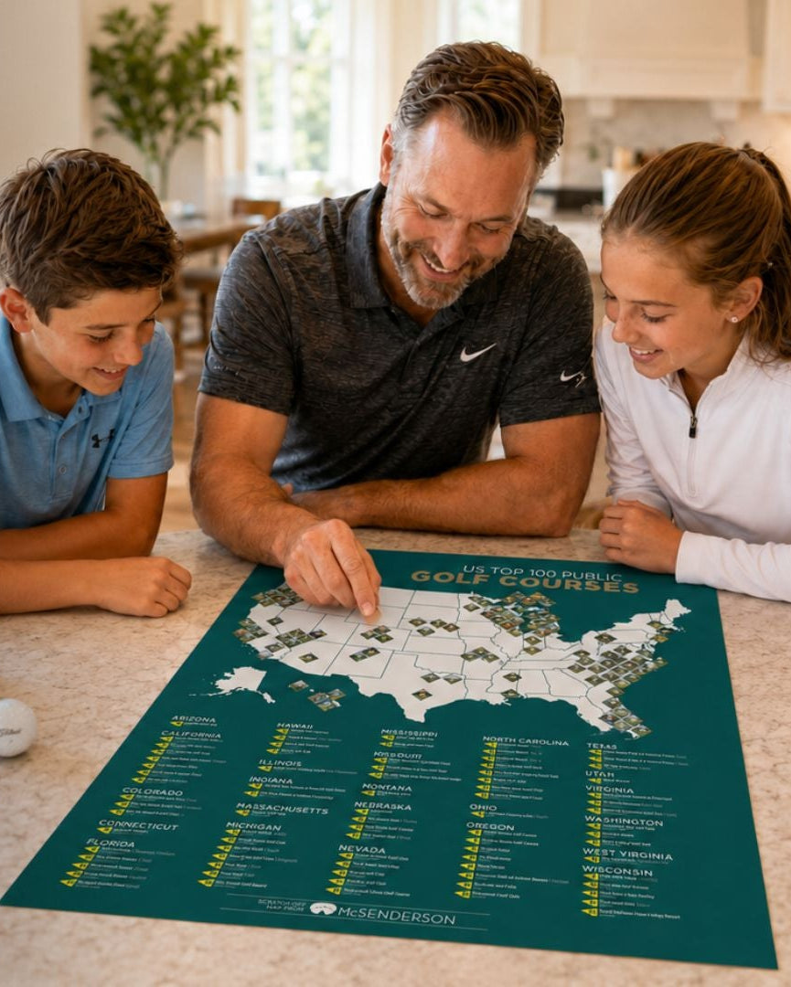 Father and two children looking at a golf course map on a kitchen counter