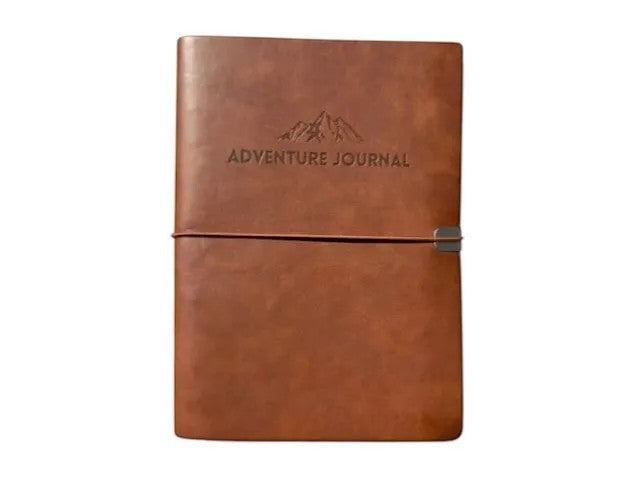 McSenderson brown leather-bound adventure journal with embossed mountain detail and elastic closure.